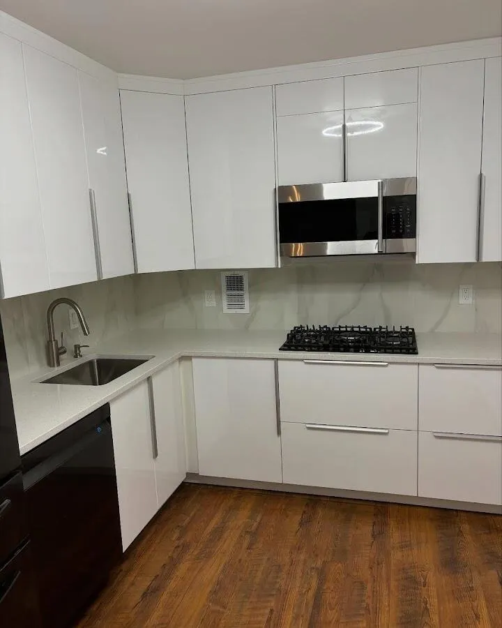 Restored kitchen with white cabinets after water damage in Pleasantville